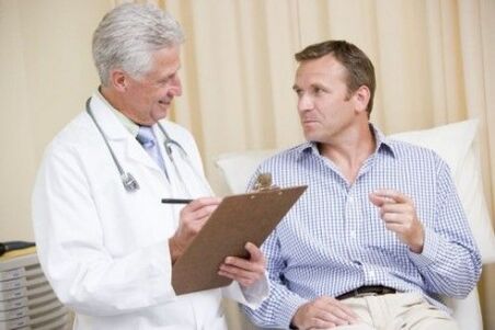 The doctor prescribes medication to a patient with prostatitis.