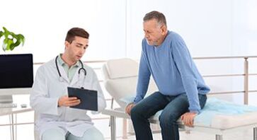 Doctor talking with patient